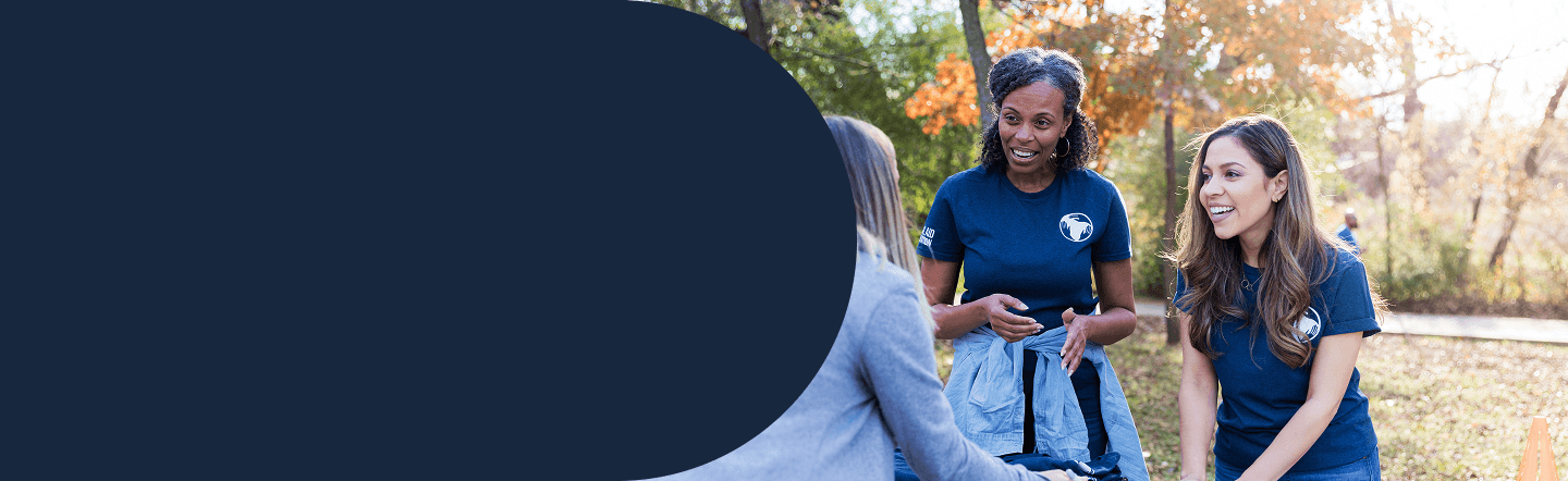 Volunteers helping a person