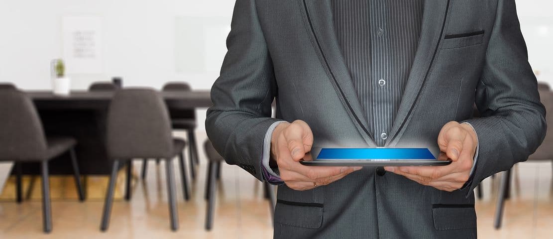 Man in suit on IPAD