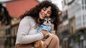 Woman hugging dog